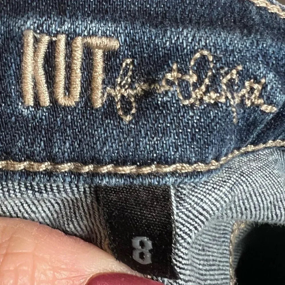 Kut from the Kloth low rise slightly distressed straight leg blue jeans size 8